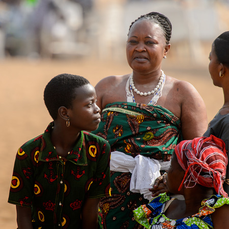OUIDAH, BENIN - Jan 10, 2017: Unidentified Beninese women talk about something at the voodoo festival, which is anually celebrated on January, 10th.のeditorial素材