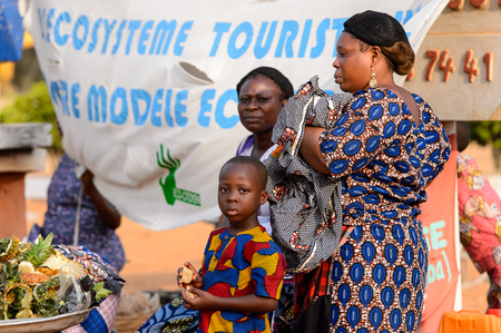 OUIDAH, BENIN - Jan 10, 2017: Unidentified Beninese people work at the local market. Benin people suffer of poverty due to the bad economyのeditorial素材