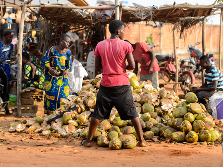 OUIDAH, BENIN - Jan 10, 2017: Unidentified Beninese people work at the local market. Benin people suffer of poverty due to the bad economyのeditorial素材
