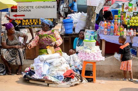 CENTRAL REGION, GHANA - Jan 17, 2017: Unidentified Ghanaian people sell goods in local village. People of Ghana suffer of poverty due to the bad economyのeditorial素材