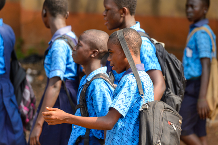 CENTRAL REGION, GHANA - Jan 17, 2017: Unidentified Ghanaian pupils in school uniform in local village. Children of Ghana suffer of poverty due to the bad economyのeditorial素材