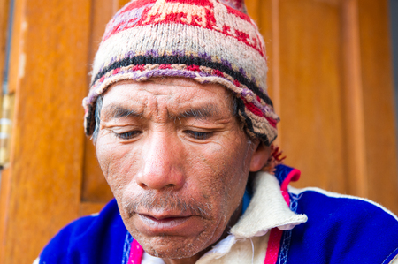 PERU - NOVEMBER 6, 2010: Portriat of an unidentified man in a hat in Peru, Nov 6, 2010. Over 50 per cent of people in Peru live below the the poverty line.のeditorial素材