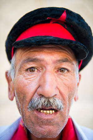 BUKHARA, UZBEKISTAN - JUNE 6, 2011: Portrait of an Uzbek man in Uzbekistan, Jun 6, 2011. 93% of Uzbek people consider that life in the country goes well.のeditorial素材