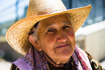 SAMARKAND, UZBEKISTAN - JUNE 10, 2011: Unidentified Uzbek womanin a hat in Uzbekistan, Jun 10, 2011. 93% of Uzbek people consider that life in the country goes well.のeditorial素材