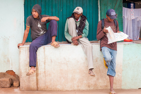 ANTANANARIVO, MADAGASCAR - JUNE 29, 2011: Unidentified Madagascar boys on the street.  People in Madagascar suffer of poverty due to the slow development of the countryのeditorial素材