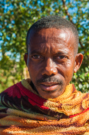 MADAGASCAR - JULY 3, 2011: Portrait of an unidentified man in Madagascar, July 3, 2011. People of Madagascar suffer of poverty due to the unstable situation.のeditorial素材