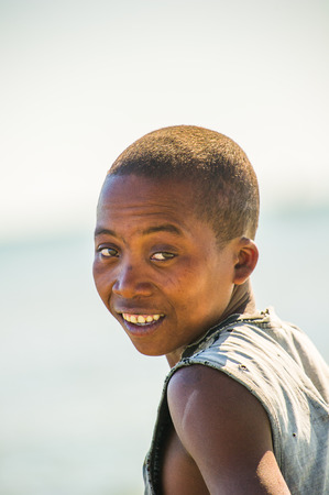 MADAGASCAR - JULY 3, 2011: Portrait of an unidentified girl in Madagascar, July 3, 2011. Children of Madagascar suffer of poverty due to the unstable situation.のeditorial素材