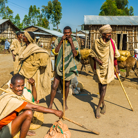 OMO, ETHIOPIA - SEPTEMBER 19, 2011: Unidentified Ethiopian people in old clothes in the street....