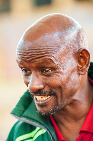 AKSUM, ETHIOPIA - SEP 24, 2011: Unidentified Ethiopian man in green jacket in Ethiopia, Sep.24, 2011. People in Ethiopia suffer of poverty due to the unstable situationのeditorial素材