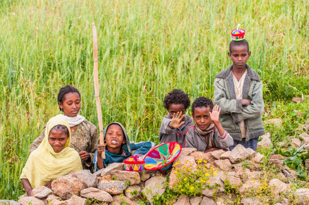 OMO, ETHIOPIA - SEPTEMBER 21, 2011: Unidentified Ethiopian boys in the street. People in Ethiopia suffer of poverty due to the unstable situationのeditorial素材