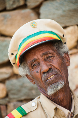 AKSUM, ETHIOPIA - SEP 24, 2011: Unidentified Ethiopian military man wearing hat in Ethiopia, Sep.24, 2011. People in Ethiopia suffer of poverty due to the unstable situationのeditorial素材