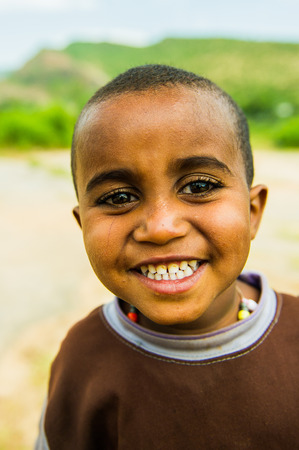 AKSUM, ETHIOPIA - SEPTEMBER 24, 2011: Unidentified Ethiopian beautiful boy smiles for the camera....