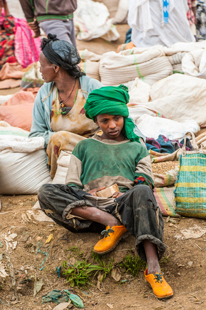 OMO, ETHIOPIA - SEPTEMBER 21, 2011: Unidentified Ethiopian boy in the street. People in Ethiopia suffer of poverty due to the unstable situationのeditorial素材