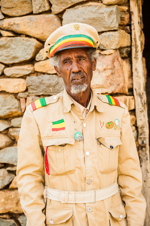 AKSUM, ETHIOPIA - SEPTEMBER 24, 2011: Unidentified Ethiopian soldier wears the national milirar...