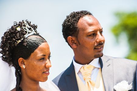 AKSUM, ETHIOPIA - SEPTEMBER 24, 2011: Unidentified Ethiopian bride and husband have a traditional Ethiopian wedding. People in Ethiopia suffer of poverty due to the unstable situationのeditorial素材