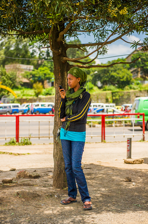 OMO, ETHIOPIA - SEPTEMBER 21, 2011: Unidentified Ethiopian girl in the street. People in Ethiopia suffer of poverty due to the unstable situationのeditorial素材