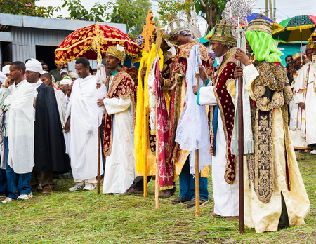 LALIBELA, ETHIOPIA - SEP 27, 2011: Unidentified Ethiopian group of people wathing the religious...