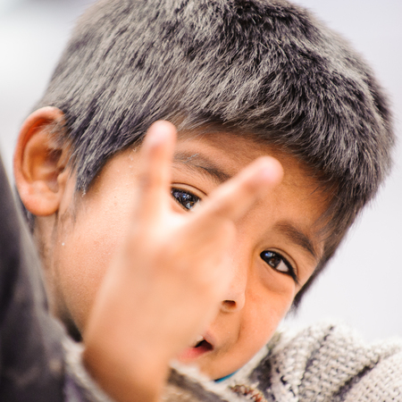 MEXICO CITY, MEXICO - DEC 29, 2011: Unidentified Mexican little boy portrait. 60% of Mexican people...