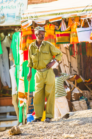 OMO, ETHIOPIA - SEPTEMBER 21, 2011: Unidentified Ethiopian man in the street. People in Ethiopia suffer of poverty due to the unstable situationのeditorial素材