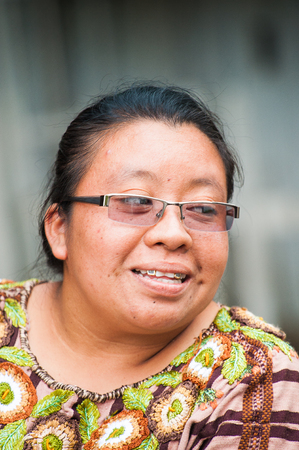 GUATEMALA CITY, GUATEMALA - JANUARY 3, 2012: Portrait of unidentified cute fat lady in in Guatemala, Jan 3, 2012. 59.4% of Guatemala people belong to the Mestizo ethnic groupyのeditorial素材