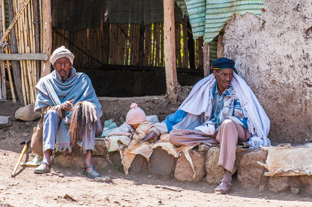OMO, ETHIOPIA - SEPTEMBER 21, 2011: Unidentified Ethiopian men near a house. People in Ethiopia...