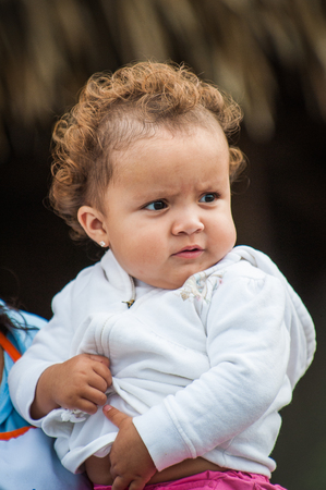 GUATEMALA CITY, GUATEMALA - JANUARY 1, 2012: Portrait of unidentified little girl in Guatemala. 59.4% of Guatemala people belong to the Mestizo ethnic groupのeditorial素材