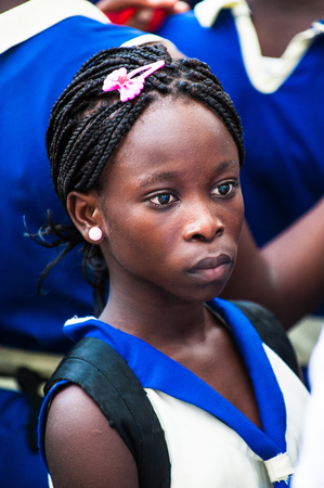 ACCRA, GHANA - MARCH 2, 2012: Unidentified Ghanaian students came to see the Elmina Castle. Children of Ghana suffer of poverty due to the unstable economic situationのeditorial素材