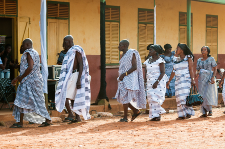 GHANA - MARCH 3, 2012: Ghanaian people in parade clothes come to see local concert of the national African music in Ghana, on March 3rd, 2012. Music is the main kind of entertainment in Africaのeditorial素材