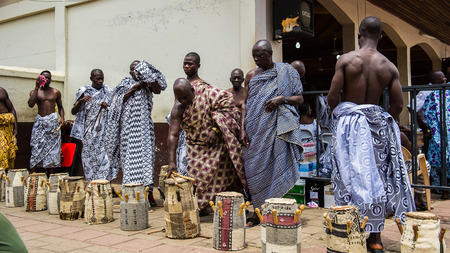 ACCRA, GHANA - MARCH 4, 2012: Unidentified Ghanaian people prepare themselves for the local musical street show in Ghana. Music is the main kind of entertainment in Africaのeditorial素材