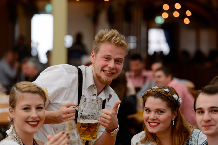 MUNICH, GERMANY - OCT 2, 2017: Unidentified boy in traditional Bavarian costume at the Octoberfest,  the world's largest festivalのeditorial素材