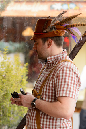 MUNICH, GERMANY - OCT 2, 2017: Unidentified man in traditional Bavarian costume at the Octoberfest,  the world's largest festivalのeditorial素材