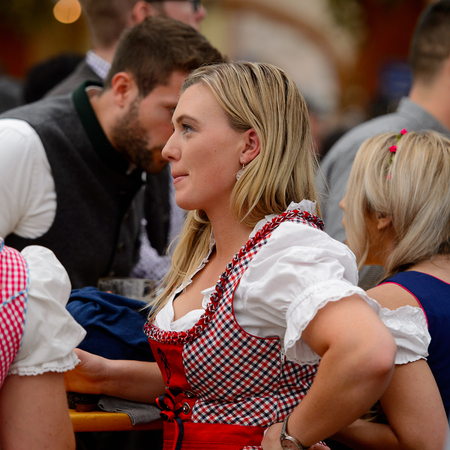 MUNICH, GERMANY - OCT 2, 2017: Unidentified girl in traditional Bavarian costume at the Octoberfest,  the world's largest festivalのeditorial素材