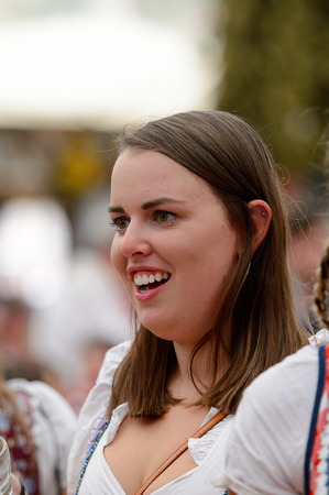MUNICH, GERMANY - OCT 2, 2017: Unidentified girl in traditional Bavarian costume at the Octoberfest,  the world's largest festivalのeditorial素材
