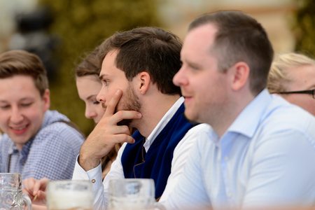 MUNICH, GERMANY - OCT 2, 2017: Unidentified friends at the Octoberfest,  the world's largest festivalのeditorial素材