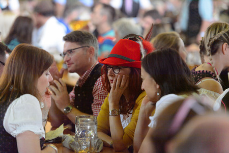 MUNICH, GERMANY - OCT 2, 2017: Unidentified people at the Octoberfest,  the world's largest festivalのeditorial素材