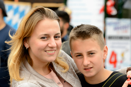 MUNICH, GERMANY - OCT 2, 2017: Unidentified boy and girl at the Octoberfest,  the world's largest festivalのeditorial素材