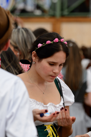 MUNICH, GERMANY - OCT 2, 2017: Unidentified girl in traditional Bavarian costume at the Octoberfest,  the world's largest festivalのeditorial素材