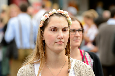 MUNICH, GERMANY - OCT 2, 2017: Unidentified girl in daisy chain at the Octoberfest,  the world's largest festivalのeditorial素材