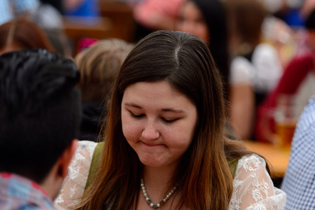 MUNICH, GERMANY - OCT 2, 2017: Unidentified people at the Octoberfest,  the world's largest festivalのeditorial素材
