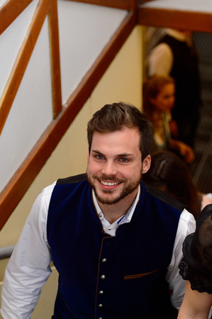 MUNICH, GERMANY - OCT 2, 2017: Unidentified man at the Octoberfest,  the world's largest festivalのeditorial素材