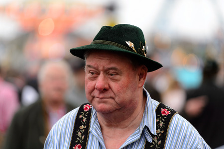 MUNICH, GERMANY - OCT 2, 2017: Unidentified man in traditional Bavarian hat at the Octoberfest,  the world's largest festivalのeditorial素材