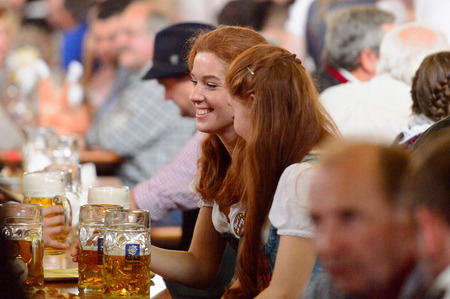 MUNICH, GERMANY - OCT 2, 2017: Unidentified people at the Octoberfest,  the world's largest festivalのeditorial素材