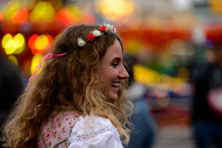 MUNICH, GERMANY - OCT 2, 2017: Unidentified girl in traditional Bavarian costume at the Octoberfest,  the world's largest festivalのeditorial素材
