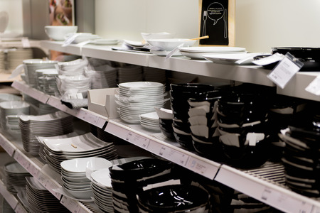 LUGANO, SWITZERLAND -NOV 4, 2017: Plates in the IKEA shop in Lugano, Switzerland. The company was found in Sweden in 1943のeditorial素材