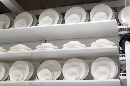 LUGANO, SWITZERLAND -NOV 4, 2017: Plates in the IKEA shop in Lugano, Switzerland. The company was found in Sweden in 1943のeditorial素材