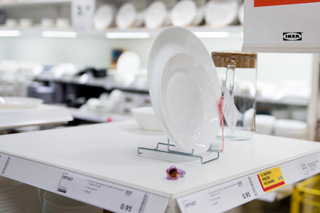 LUGANO, SWITZERLAND -NOV 4, 2017: Plates in the IKEA shop in Lugano, Switzerland. The company was found in Sweden in 1943のeditorial素材