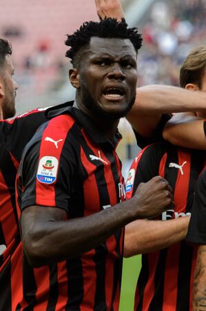 MILAN - OCT 7, 2018: Franck Kessie celebrate Higuain's goal. AC Milan - Chievo. San Siro stadium. Serie A.のeditorial素材