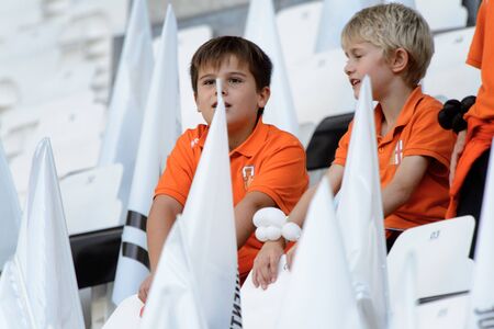 TURIN - OCT 20, 2018:  Children on the Tribunes of the Alliaz Stadium. Italian league Serie A.のeditorial素材