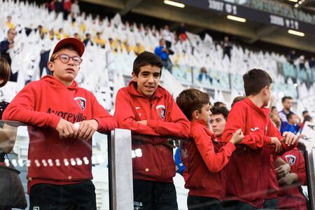 TURIN - OCT 20, 2018:  Children on the Tribunes of the Alliaz Stadium. Italian league Serie A.