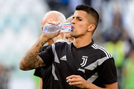 TURIN - OCT 20, 2018:  Joao Cancelo drinks water. Juventus F.C. - Genoa C.F.C. Alliaz Stadium. Italian league Serie A.のeditorial素材